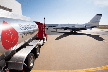 fuel truck filling a cessna citation latitude jet with SAF